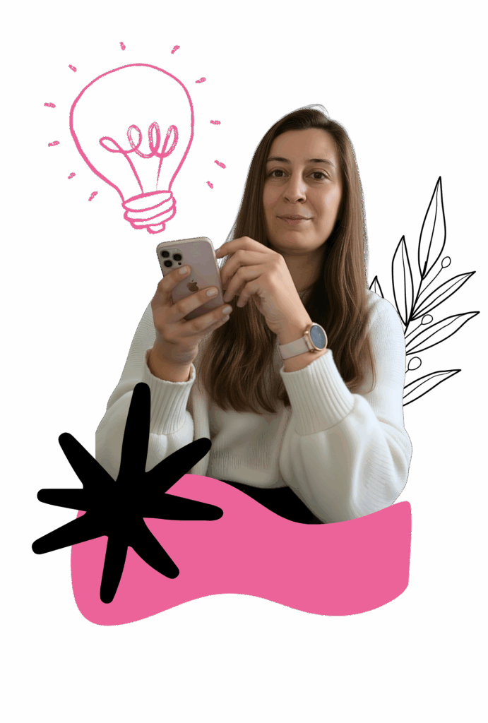 Dominika w trakcie pracy z telefonem w ręku, tworząca conten na social media